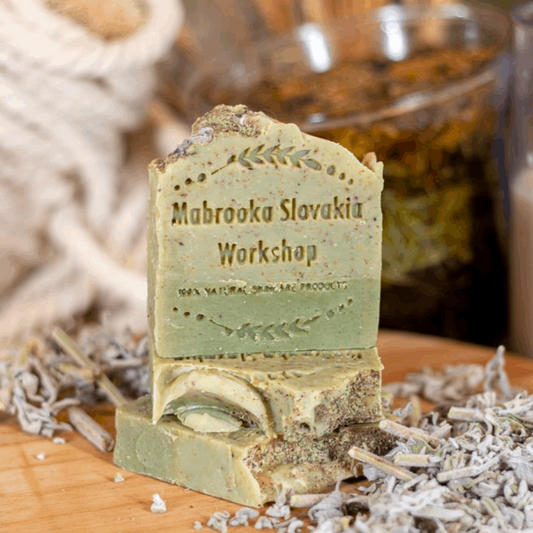 white sage hand made soap with dried sage on wooden table 